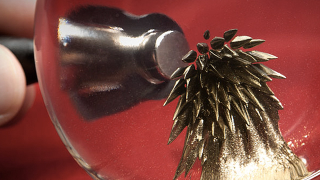 Illustration for article titled Golden Ferrofluid Fulfills Your Midas and Magneto Fantasies